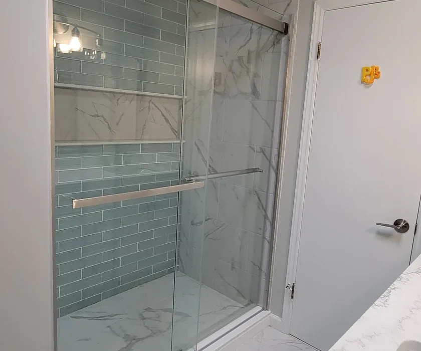 Guest bathroom remodel with ceramic tile floor, vanity and stone countertop
