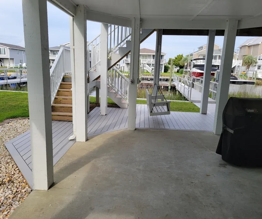 Composite deck board replacement on an existing backyard deck