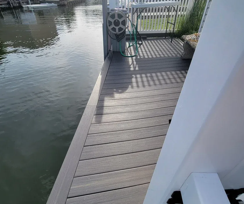 Composite deck board replacement on an existing backyard deck