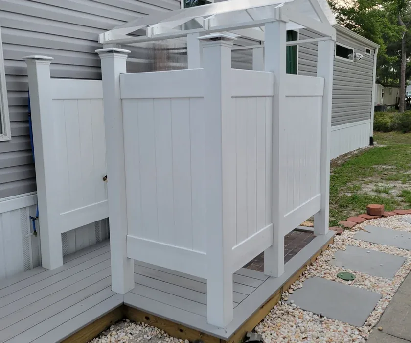 New backyard deck with composite boards and railings in Charlotte, NC