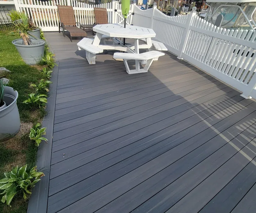 New backyard deck with composite boards and railings in Charlotte, NC