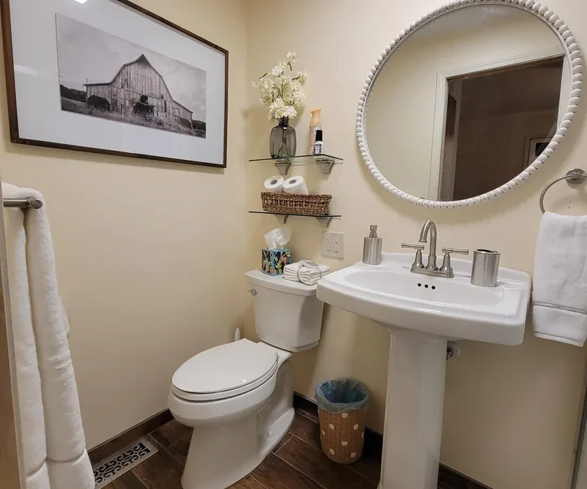 Remodeled bathroom with tiled walk-in shower and glass enclosure in a Charlotte, NC home