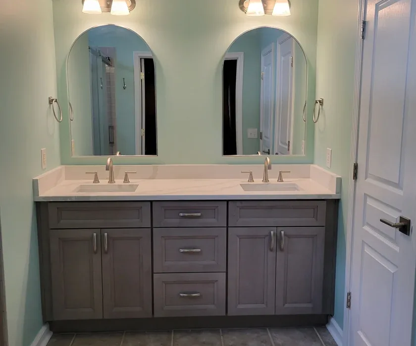 Guest bathroom remodel with ceramic tile floor, vanity and stone countertop