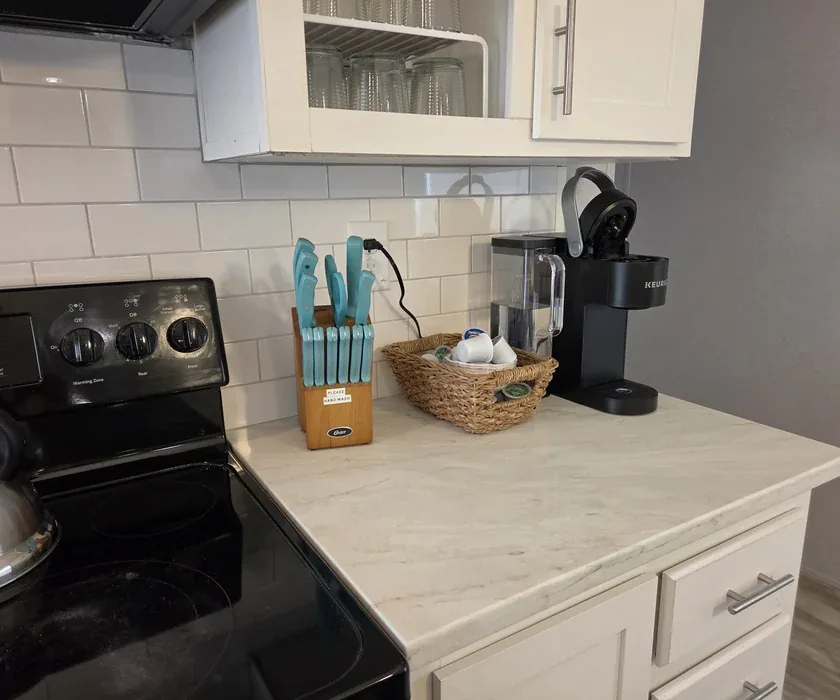 Kitchen remodel with island, new cabinetry and hardwood flooring