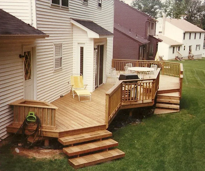 Composite deck board replacement on an existing backyard deck