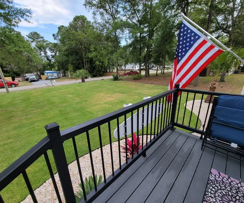 Composite deck board replacement on an existing backyard deck
