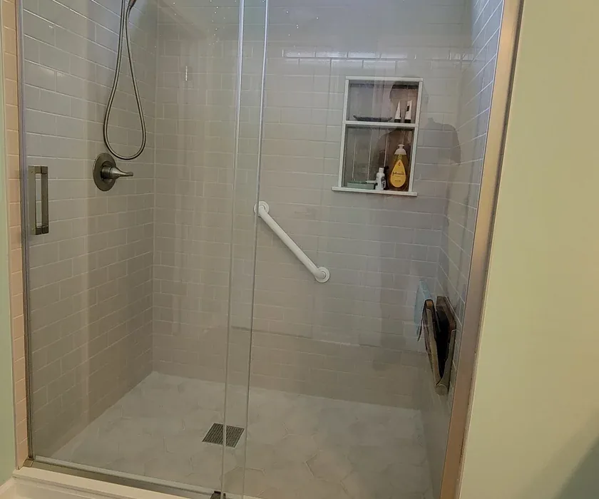 Guest bathroom remodel with ceramic tile floor, vanity and stone countertop