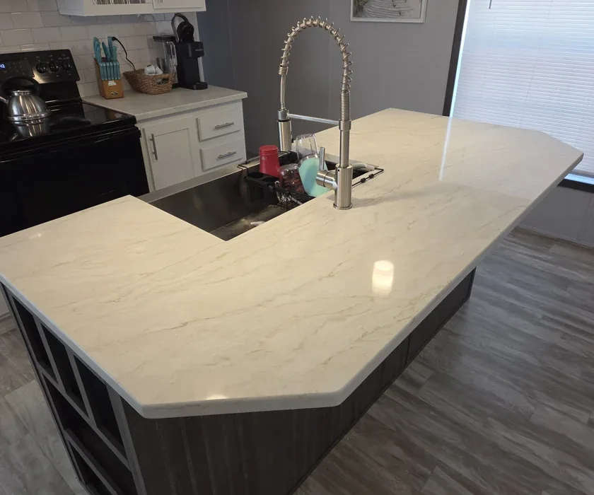 Remodeled kitchen with shaker cabinets, stone countertops and tile backsplash in Charlotte, NC
