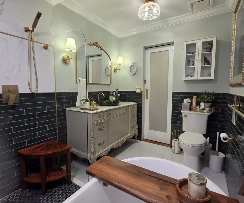 Remodeled bathroom with tiled walk-in shower and glass enclosure in a Charlotte, NC home